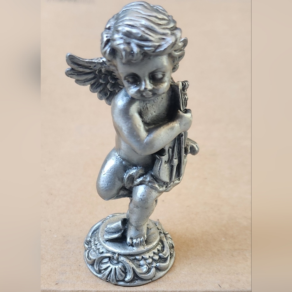 Vintage cherub holding violin mini statue new in box
